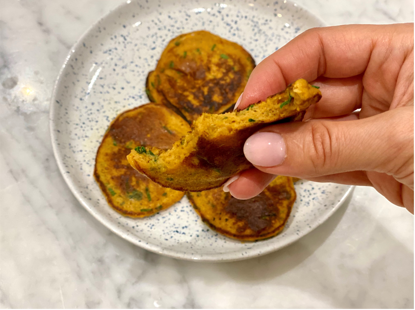 A plate of sweet potato blinis - a recipe made for gut health and inflammation reduction.