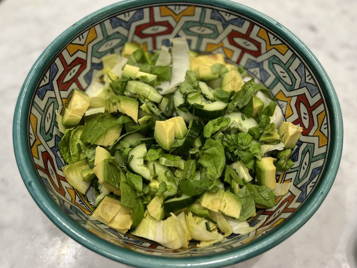 Herbs, lettuce and avocado in a bowl - an anti cancer recipe