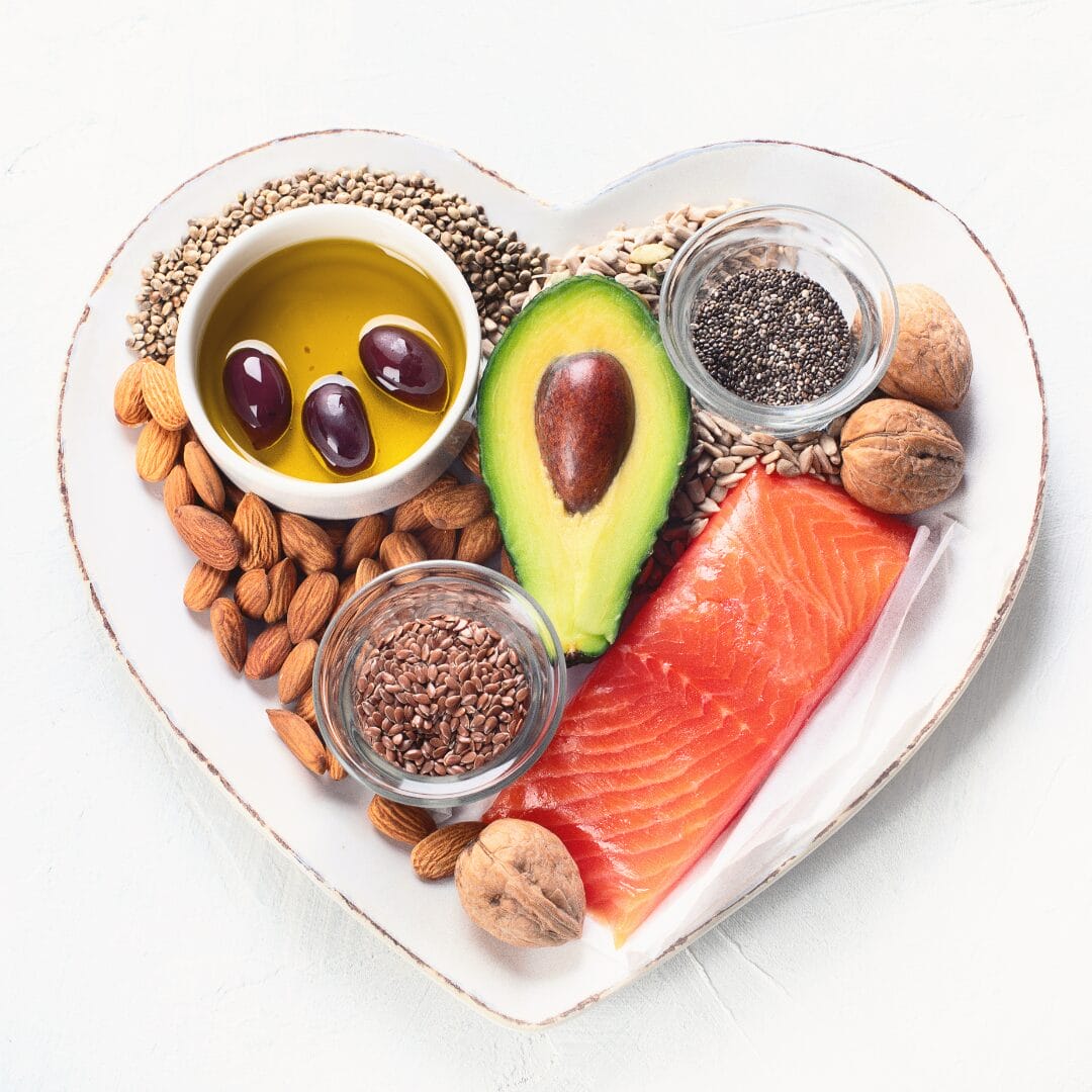 heart bowl of healthy foods used for cholesterol advice