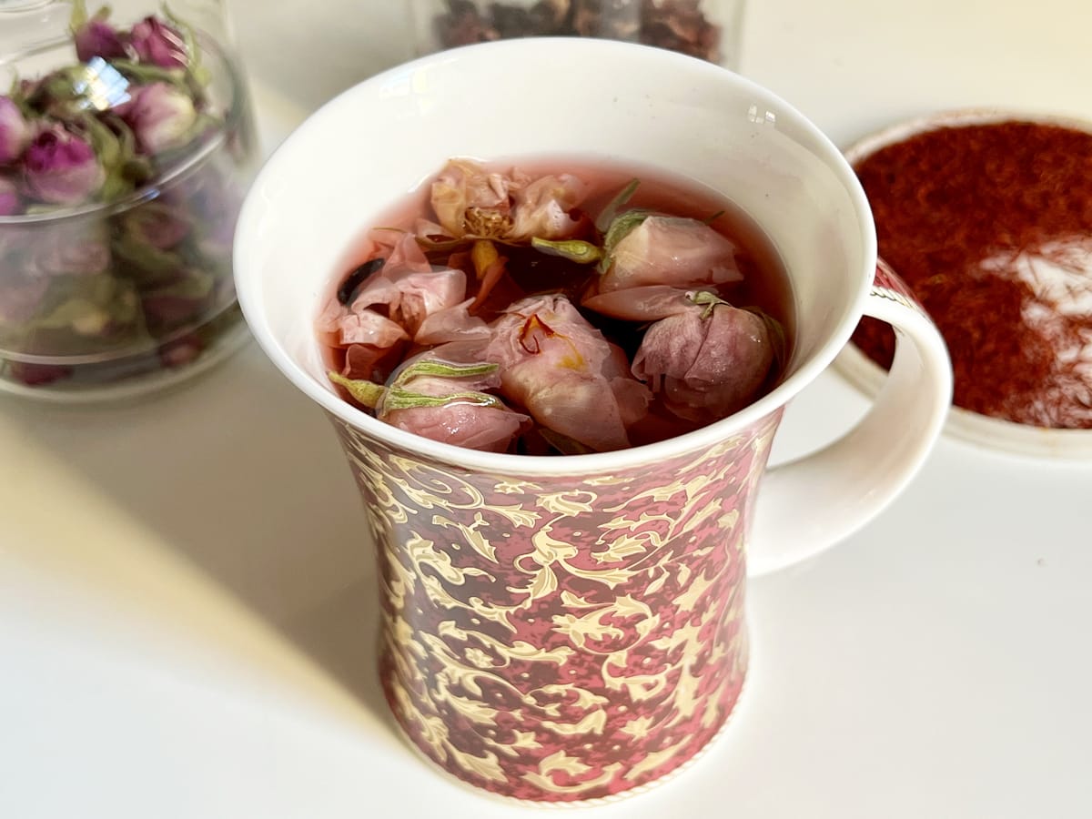 mug of tea with rosebuds
